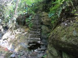 Eroded stairway with the only fixed rope. Fautanua Valley