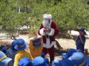 Primary school party in the park with santa