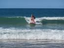 Olivia surfing Mooloolaba