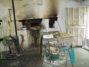 75 year old stone oven, heated with local Mesquit wood - Super pan (bread). ready at 2pm each day -by 4pm they are sold out. 