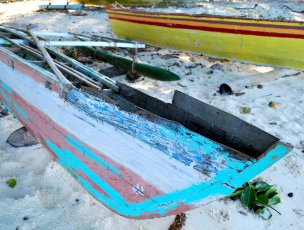 outrigger canoes are made with very small sticks tied together with bits of fishing line.