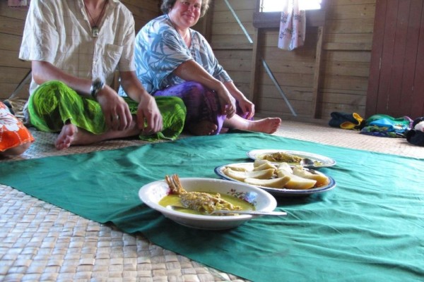 Dakuniba breakfast of curried fish and breadfruit