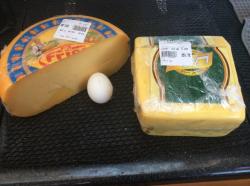 Cheese from Port Suez.  2 K of Gouda and 2 K of something else.