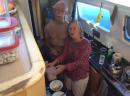 Mike and Joan in the galley of Pied-a-Mer.