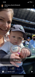 RACHEL AND JAMESON AT A MARINERS GAME.