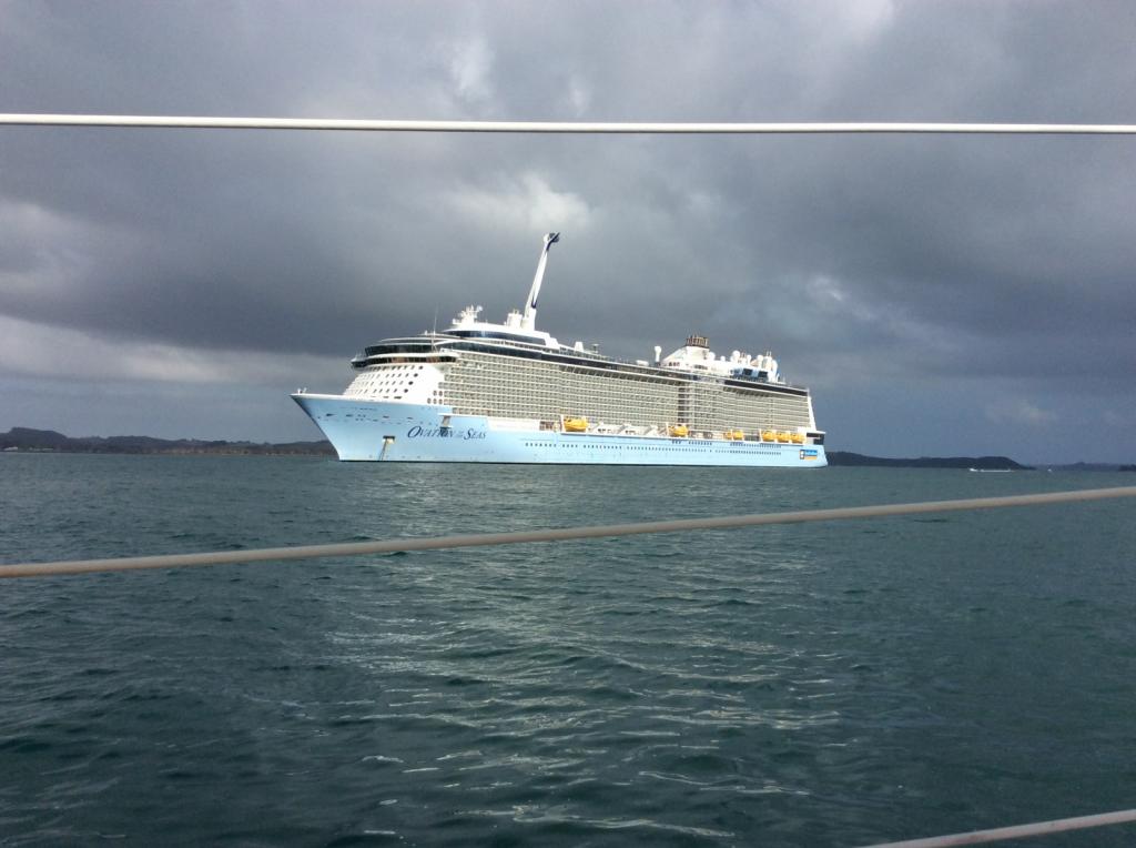 Cruise ship anchored.  .  Tourists flock to Paihia  and Russell.  