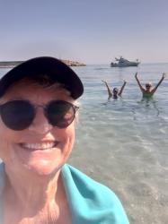 Hidi takes a “selfie” with Pam and Jayni in the water.
