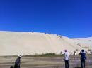 Sand Boarding: Coming down the dune on the boogie board was fun-----climbing up the steep sand hill was not fun!