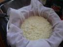 MAKING CHEESE: Curds draining.