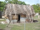 older hut with thatched roof and clad in basket-work