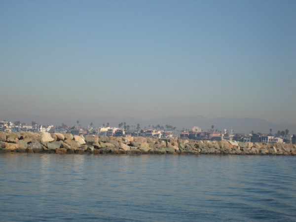 Long Beach houses behind breakwater