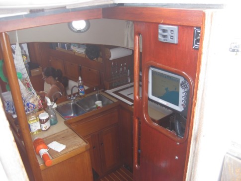 10 Inch plotter with C-Map at cabin entrance on swinging arm
