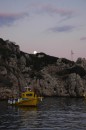 Moonrise over the small island at Ay Nikolas