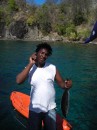 Soufriere Bay boat man with tuna and mobile