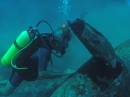 Phil inspects the P38 WWII wreck at Basilaki Island