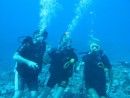 John, Meredith and Phil diving with the sharks at Moorea