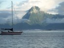 the view of Moorea from our back deck at dawn from the anchorage at Marina Taina, Papeete