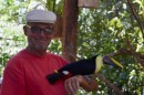 Toucan and Reg - the bird reached up and tried to grab the peak of Reg