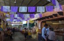 The purple flags for easter.  Note the booth on the right hand side is selling mezcal which is the drink of choice in the state of Oaxaca instead of tequilla