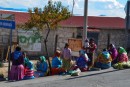 The local Tarahumaru women and children who are selling the goods waiting for the next train to arrive