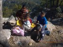 The local family selling goods at the cliff dwelling location but not the owner of the home