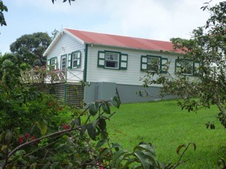 A typical Saban house - all houses need red roof, green shutters and have to be white - it