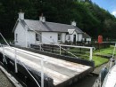 A cottage and a bridge along the way thru the Crinan Canal 13 May