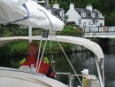 Marty at the helm in the Crinan Canal 13 May