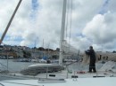 Paul working aboard Canty in the marina at Sada after the launching