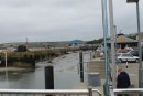 View of the outer harbor at Padstow at low tide, standing above the lock gate for the inner harbor