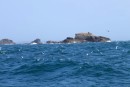 The rocks to the west of Bryher Island after leaving New Grimsby Sound on our way to The Cove between St. Agnes Island and Gugh Island