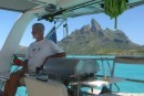 Chuck having another rough day at Bora-Bora on S/V Victory Cat.