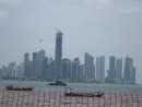 Fishing boats, Pelicans and the financial district of Panama City, Panama