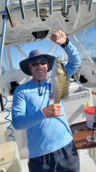 Bob and a snapper: Bob caught this nice Mangrove snapper out fishing