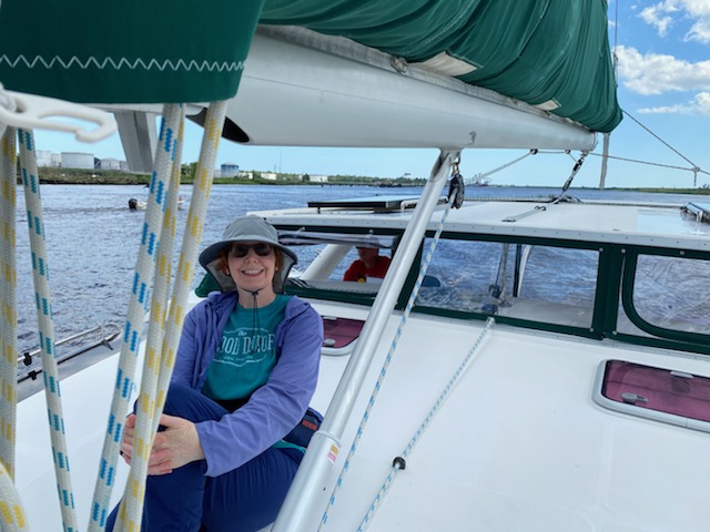 Friends on the Boat: We had lots of friends come and visit us in Wilmington, NC (Photo of Cathy Hren on the bow)