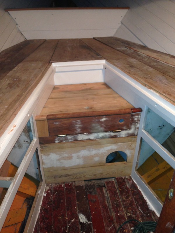 This shows the forepeak with most of the ceiling work completed and the refurbished (work in progress) cabinet faces temporarily fitted in place.