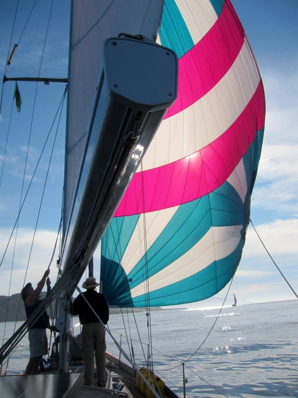 The beautiful cruising spinnaker is up 