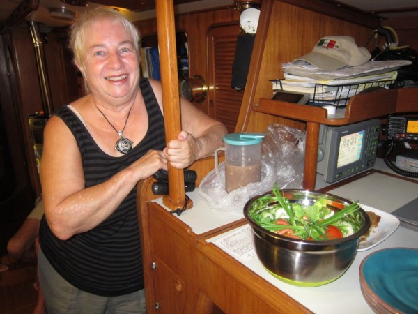 Sandi from Covenant brings a beautiful salad to our boat for dinner.  She