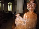 Each ornamentation at the end of the pew was carved of a different animal or person