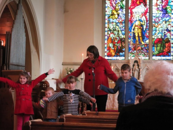 Margaret leads Sunday worship with the children.  