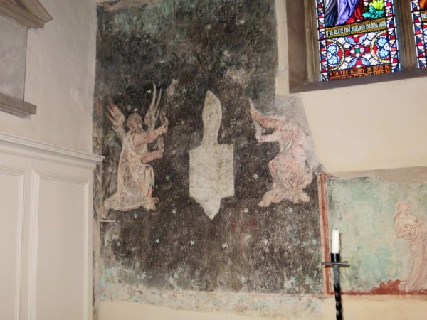 Medieval painting of Angels at a statue of Mary and Jesus, also being reclaimed 