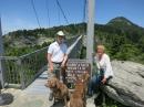 Bob and Karyn takes the dogs on a suspension bridge on Grandfather Mountain