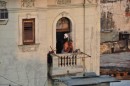 Jim shot this pic of a man brushing his teeth on his balcony. Some of the buildings in Havana are in very rough shape, but still they house many Cuban families.