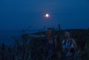 Rick and Jayne and ourselves hiked up the hill to watch the sunset and the full moon rising! 