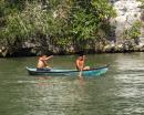 These dug out canoes are the main means of travel for the Mayan people. The are called Cayucos. They are rugged and stable enough for the fishermen to stand up and throw nets with out tipping. 