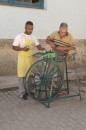 Sharpening knives and scissors in downtown Havana
