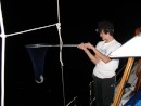 cabo 085: Zak fishing off the boat at night... in the anchorage.