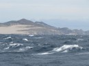 Rounding Capo Falso, 25-30 knots of wind.