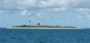Moris Island. To the left and right and far behind is reef. Anchorage here is good in the prevailing SE winds. 2/7/13