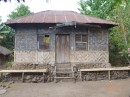 This Letefui house is hundreds of years old. the original thatched roof has been replaced with iron but the woven bamboo walls, which are common in Indonesian villages, are original. Alor. 6/9/13